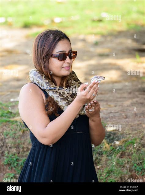 Image result for Python Wrapped around Woman