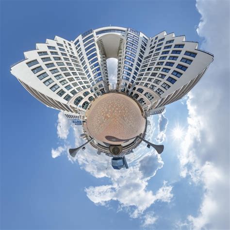 Abstract swirling tiny planet spherical panorama of multistorey ...