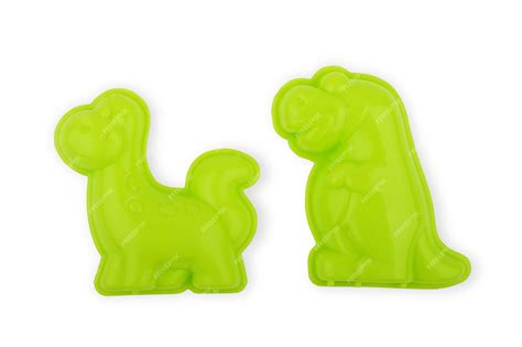 Premium Photo | Top view of green octopus and shellfish toys on pink background