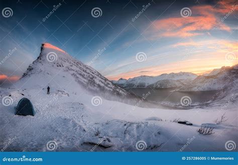 Panorama of Sunrise Over Snowy Mountain Range with Mountaineer Tent ...
