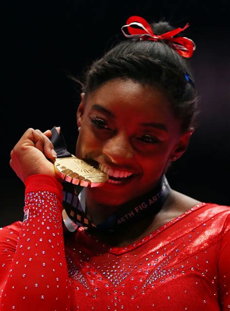 Why Do Olympians Bite Their Medals? It Has More To Do With Science Than You Might Expect — VIDEO