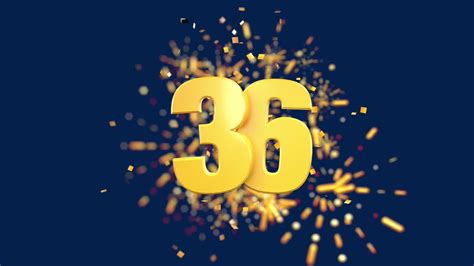 Gold number 36 in the foreground with gold confetti falling and ...