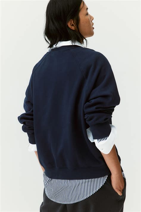 Raglan-sleeved sweatshirt - Navy blue/Firenze - Ladies | H&M IN