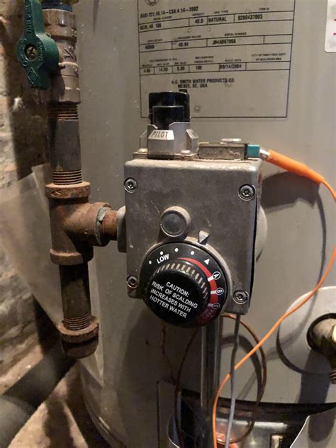 New apartment and hot water is lukewarm at best. How do I turn up the ...