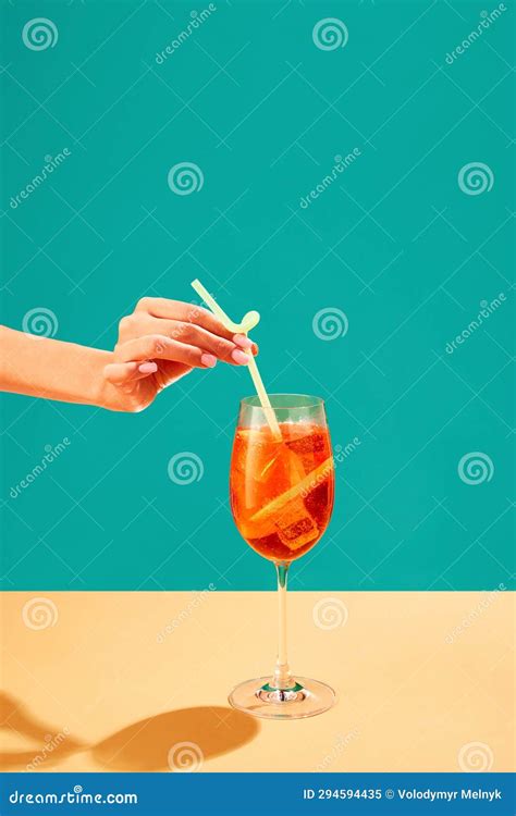 Female Hand Putting Straw into Aperol Spritz Cocktail. Traditional Taste, Alcohol, Refreshment ...