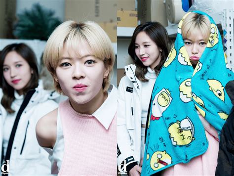 TWICE members will captivate you with their adorable "aegyo" photos