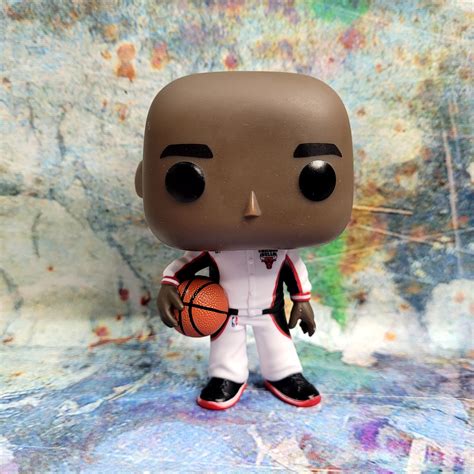 Funko Pop Michael Jordan Exclusivo - caja dañada