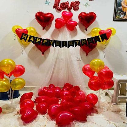 Romantic Cabana setup balloon decoration in living room with fairy lig ...
