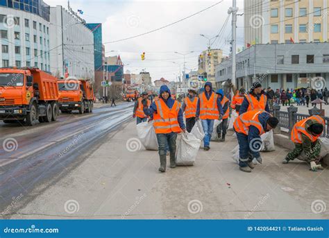 City Workers Collecting Garbage in the City Center on a Nasty Day Editorial Photo - Image of ...