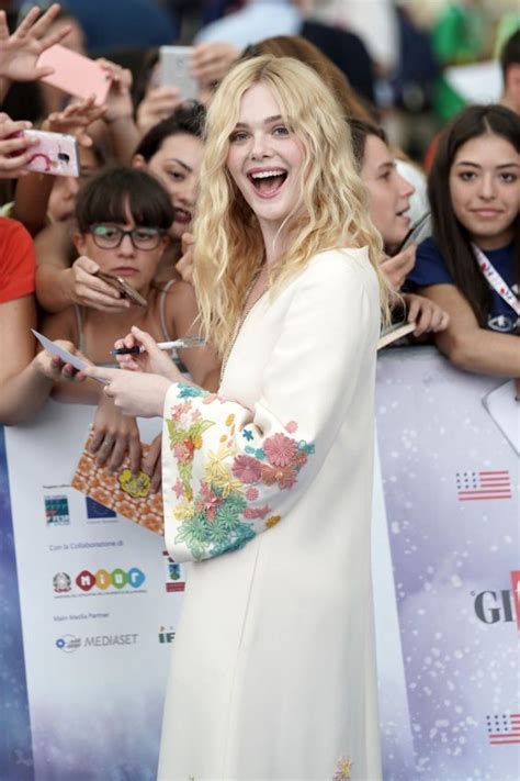 Elle Fanning Looks Drop-Dead Gorgeous In This White Floral Dress ...