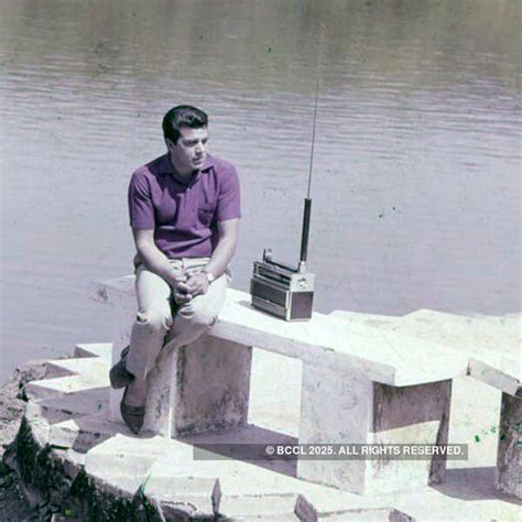 Dashing Dharmendra poses for the cameras during a photoshoot.