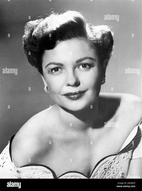 MARJORIE REYNOLDS (1917-1997) American film actress in 1955 Stock Photo ...
