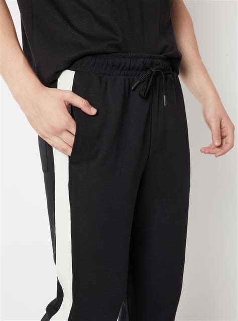 Buy Men Side Taped Sports Track Pants Online at just Rs. 1199.0 ...