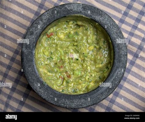 guacamole inside molcajete (traditional mexican mortar and pestle for ...