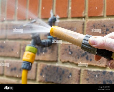 Hose attachment hi-res stock photography and images - Alamy