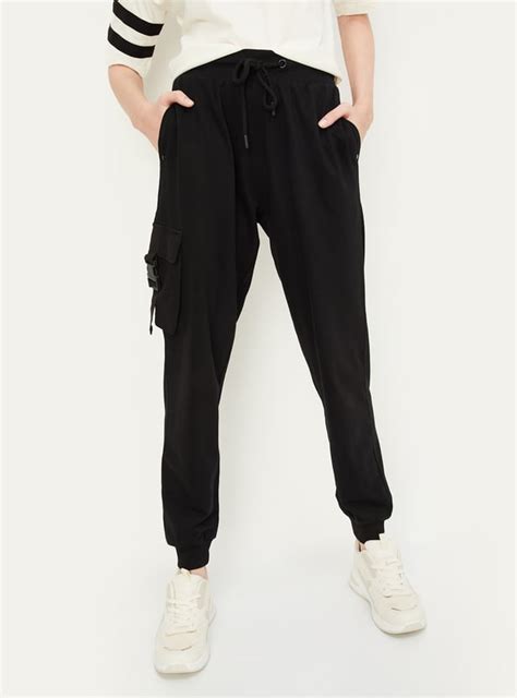 Buy Women Solid Relaxed Fit Cargo Joggers Online at just Rs. 899.0 ...