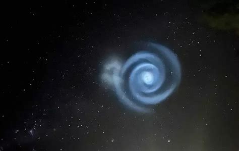 Glowing Blue Spiral Light Appears In New Zealand Skies