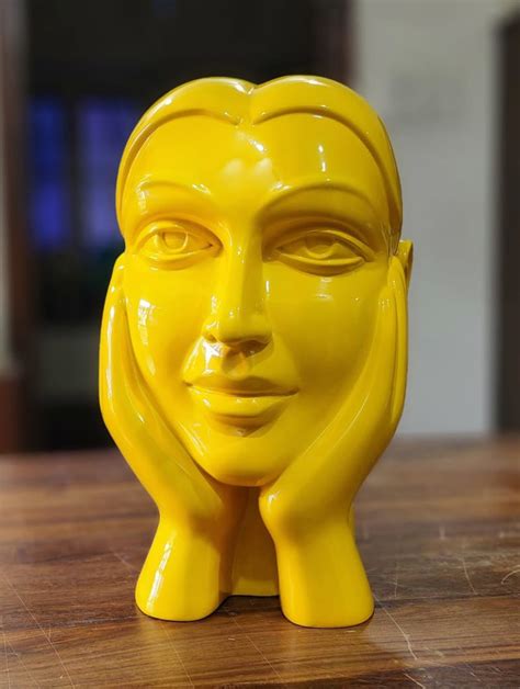 "Face 11": Yellow Figurative sculpture by Dvs Krishna | ArtZolo.com