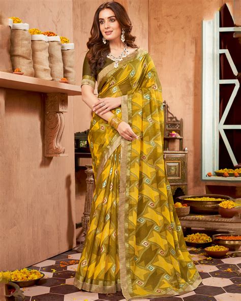 Vishal Prints Mustard Printed Brasso Saree With Foil Print And Fancy B