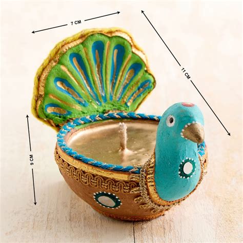 Buy Utsav Set of 2 Earthen Clay Embellished Peacock Diyas from Home ...