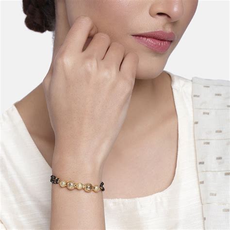 Gold Plated Macrame Bracelet with Black Beads – Estele