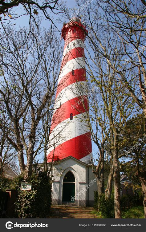 Red White Striped Lighthouse — Stock Photo © DirkM.deBoer #511030982