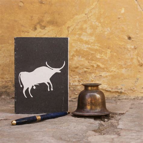 Step Back in Time with Our Ancient Cow Cave Painting Notebook - dekulture
