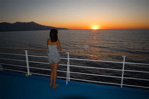 Asian Teen in Tube Top Standing on Deck of Ferry Looking at Sunset ...