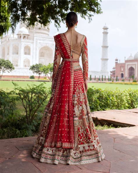 Buy Zelie Red Lehenga Set Replete With Multicolored Threadwork