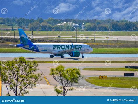 Frontier Aircraft on Runway Preparing for Departure from the Orlando ...