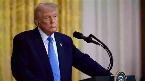 "Superstitious" Trump says higher aspirin dosage behind hand bruises