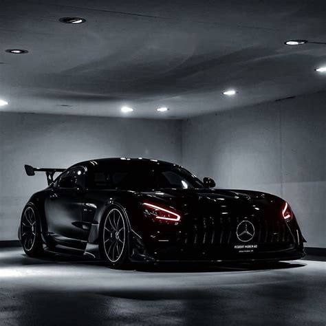 Black Mercedes-Benz AMG in Dark Parking Garage