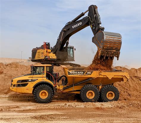 Image result for Large Excavators Loading Trucks