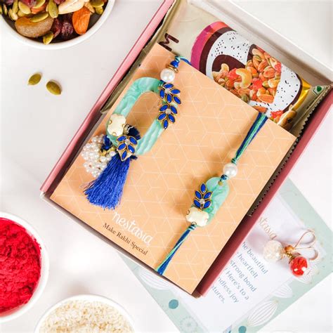 Blue Leaf Motif Designer Rakhi Lumba Set Of 4 With Box And Card Online ...
