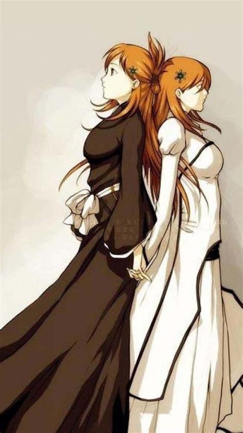 Download Orihime Inoue Stands Victorious With Her Galaxy Hair Wallpaper ...