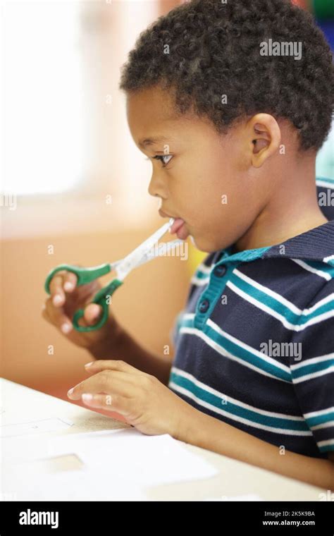 Image result for Child Using Scissors