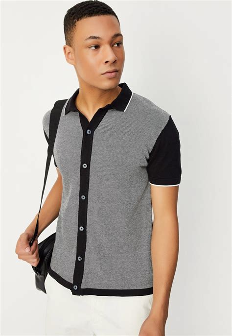 Buy Men Slim Fit Colourblocked Knit Polo T-shirt Online at just Rs. 999 ...