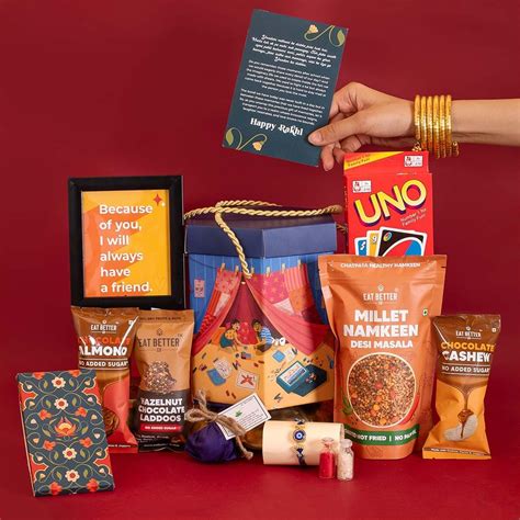 EAT BETTER CO Yaadon Ka Dabba 10-Item Rakhi Gift Hamper Evil Eye Rakhi ...