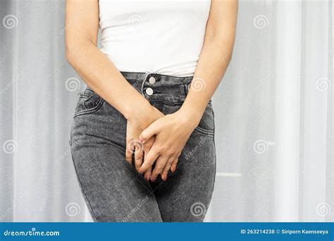 Woman Holding Wet Pants Can`t Control Her Pee because of Stress Urinary Incontinence Stock Photo ...