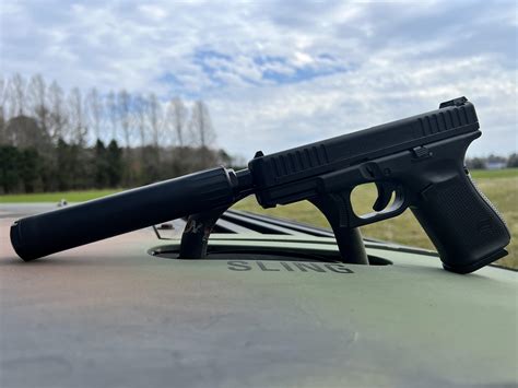 Somethin' from a personal collection. Glock 44 w/ OSS Suppressor. Quiet ...