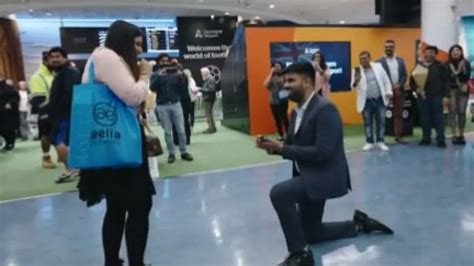 Indian man proposes to girlfriend at Auckland airport in Bollywood ...