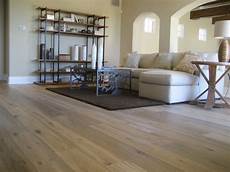 Wood Or Carpet In Living Room by Wide Plank Wood Floors In Living Rooms Traditional Wood Or Carpet In Living Room