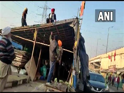 After year-long protest, farmers begin journey back home