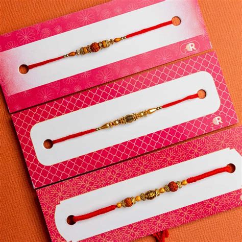 Send Traditional Set of 3 Rakhis With Kaju Katli Online | Rakhibazaar.com