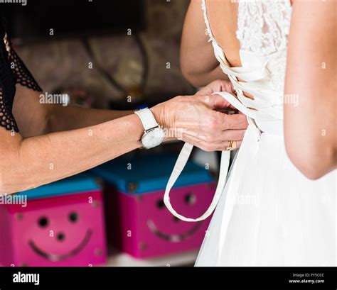 Image result for Bridesmaid Helping Bride