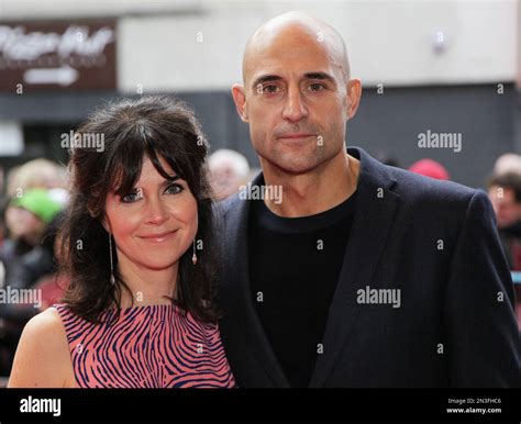 Producer Liza Marshall, and husband actor Mark Strong pose for ...