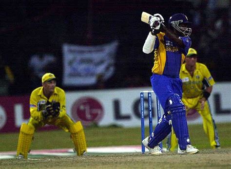 McGrath manages to get a ball past the outside edge of Atapattu ...