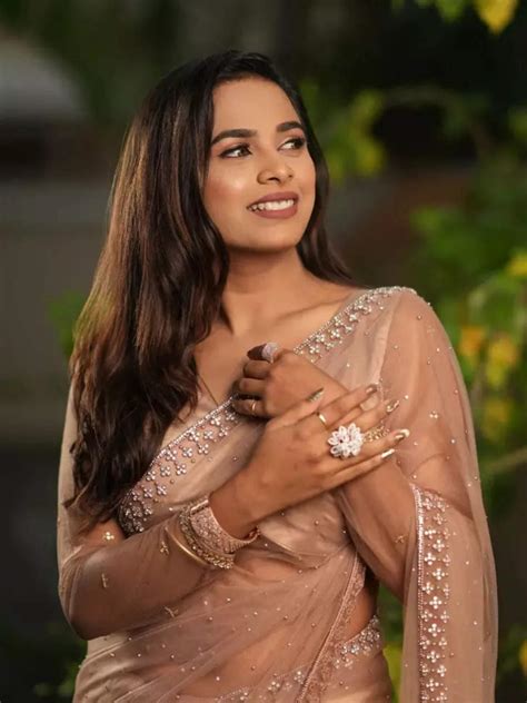 Birthday girl Amruta Dhongade shines in rose gold sequin saree | Times ...