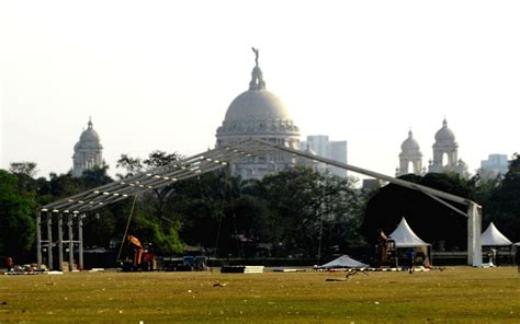 Workers at Brigade Parade Ground ahead of the Prime Minister rally in ...