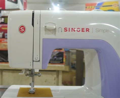 Image result for Singer Simple 3232 Portable Sewing Machine